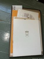 Tray holding portfolio and prints