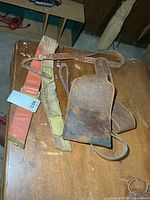 Holster, two belts on table overview