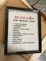 Full view of framed advertisement sign