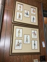 Both framed print sets on wall showing frames and prints