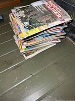 Side view of stack of magazines