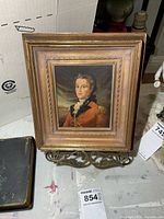 Front view of framed officer print on stand