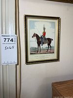 Full view framed print with lot tag showing scale