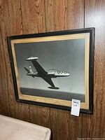 Full view of framed T-33 photograph on wall