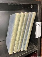 Five cloth-bound War in Pictures volumes on shelf