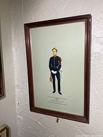 Full view of framed print on wall