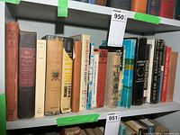 Shelf of assorted war history books