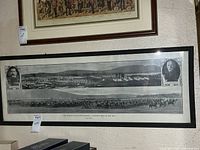Full view of framed panoramic print on wall