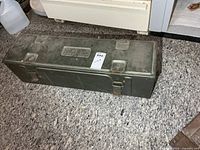 Top view showing full case, latches and label