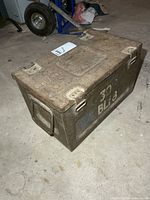 Full view of metal ammo box showing size, handles and lid detail