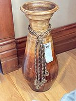 Full view of vase front showing rope accent and height