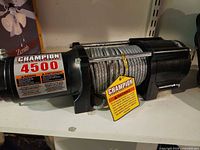 Overall view of Champion 4500 lb winch with cable spool