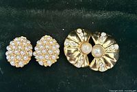 Both earring pairs side by side