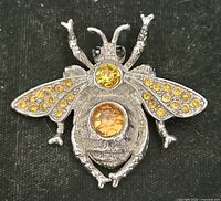 full view of silver-tone bee brooch front
