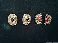 Front view showing both pairs of clip-on earrings