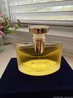 Front view of Bvlgari Eau de Parfum bottle showing brand label and liquid level