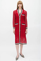 Front view of red GG lace dress on model