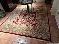 Rug full view showing pattern and borders