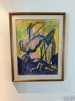 Framed Joseph Amar mixed media artwork on wall