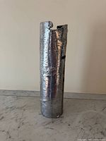 Front view of silver birch-bark textured vase