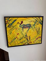 Frontal view of framed acrylic painting showing full artwork