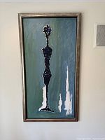Full view of framed painting on wall