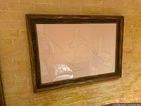 Front view of framed Joseph Amar line drawing on wall