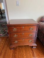 Front view first chest showing drawers and hardware