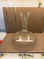 Front view of clear crystal ship's decanter