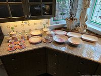 Full set laid out on countertop showing quantity and variety of pieces