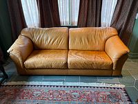 Front view of tan Selene leather sofa