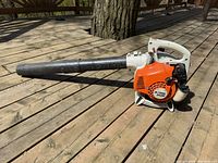 Full view of Stihl BG 55 leaf blower with tube attached