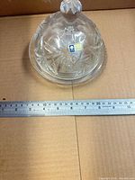 butter dish with ruler showing diameter