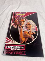 Front cover of comic showing title, James Bond 007 logo, creator credit