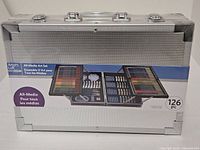 Front view of sealed Artist's Loft art set in aluminum case with printed sleeve