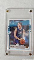 Front of LaMelo Ball Rated Rookie card in acrylic case