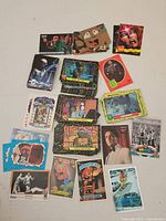 Overview of various trading cards spread out on surface