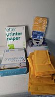 Overview of printer paper packs and envelopes