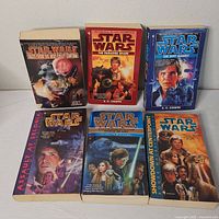 Front covers of all six Star Wars paperbacks arranged in two rows