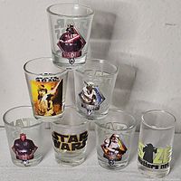 Front view of all seven Star Wars shot glasses arranged in pyramid