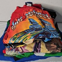 Stack of multiple boys T-shirts