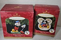 Front view of both Hallmark ornament boxes