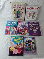 All seven graphic novels laid out