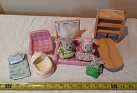 All items laid out with measuring tape for scale