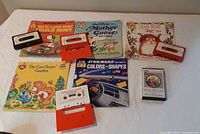 All books and cassettes laid out on table
