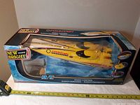 Boxed New Bright Fountain RC boat front view showing branding and packaging