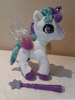 Unicorn left side with wand on table