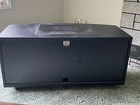 Front view of black TV stand showing full cabinet