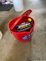 Vileda red bucket containing HydroWax box