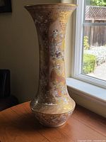 Full view of tall Satsuma vase showing shape and decoration